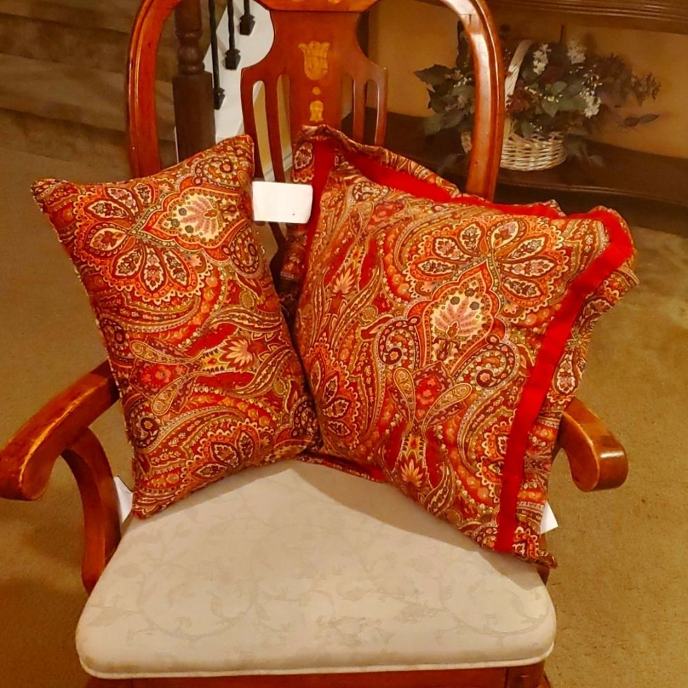 2 Raymond Waites Throw Pillows